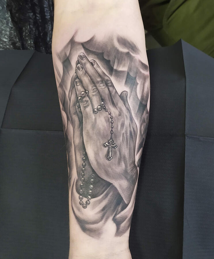 Praying Hands Realistic religious tattoo of praying hands. Tattoo by VampyCrafts in Cologne
